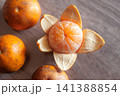 Fresh oranges packed with vitamins fiber and nutrients supporting wellness energy  141388854