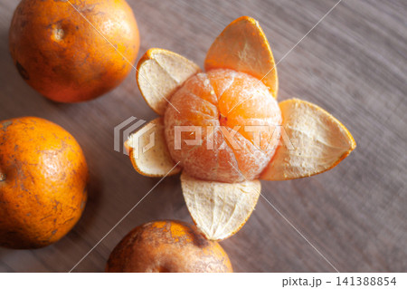 Fresh oranges packed with vitamins fiber and nutrients supporting wellness energy  141388854