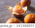 Fresh oranges packed with vitamins fiber and nutrients supporting wellness energy  141388855