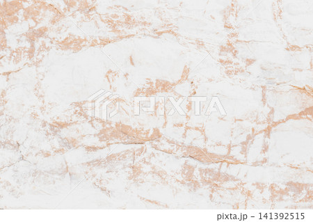 Abstract high key background texture of bright white marble stone with warm beige veins for luxury product placement backdrop or clean modern wall cover Abstract high key background texture of bright white marble stone with warm beige veins for luxury product placement backdrop or clean modern wall cover 141392515