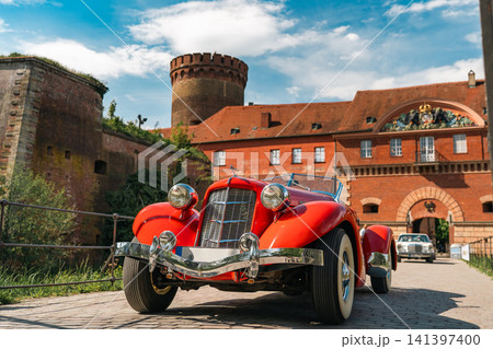 Auburn Boattail Speedster Driving Through Historic Fortress Auburn Boattail Speedster Driving Through Historic Fortress 141397400