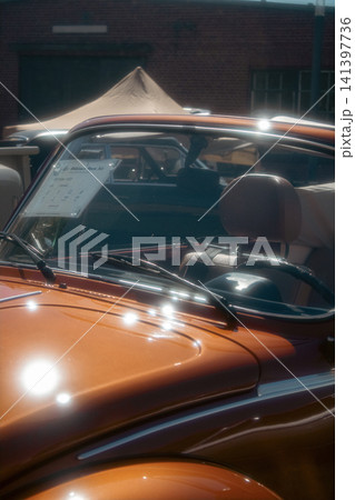 Orange Volkswagen Beetle 1303 Cabriolet at Car Show 141397736