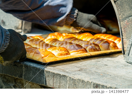 The pies are baked in the oven. The pies are baked in the oven. 141398477