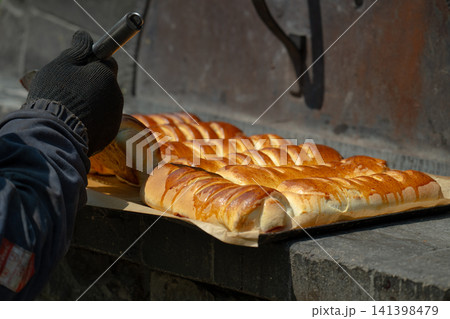 The pies are baked in the oven. The pies are baked in the oven. 141398479