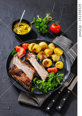 British Pub Style Classic Roasted Pork Ribs British Pub Style Classic Roasted Pork Ribs 141398529