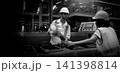 Ai using. Engineers and technicians use AI technology to inspect industrial machinery. Workers using Ai and augmented reality to optimize manufacturing process. Smart factory innovation. Industry tech 141398814