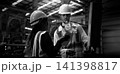 Ai using. Engineers and technicians use AI technology to inspect industrial machinery. Workers using Ai and augmented reality to optimize manufacturing process. Smart factory innovation. Industry tech 141398817