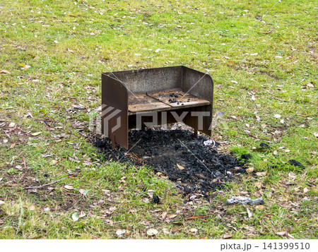 A fire pit and barbeque in a remote campground in the Blue Mountains 141399510