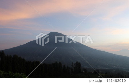 A peaceful mountain peak at gentle twilight. A peaceful mountain peak at gentle twilight. 141402010