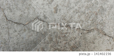 Cracked gray concrete surface texture Cracked gray concrete surface texture 141402156