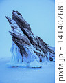Spectacular landscape of the Dragon tail rock while snowing located at Ogoy island in frozen lake Baikal in winter season. 141402681