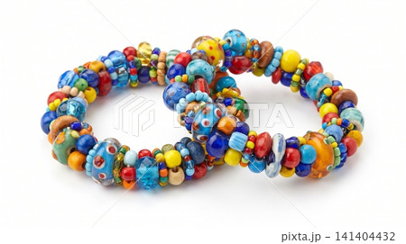 Pair of colorful handmade glass bead bracelets isolated on white background with bracelet colorful accessory handmade decoration ornament wristband jewellery collection reflection spherical Pair of colorful handmade glass bead bracelets isolated on white background with bracelet colorful accessory handmade decoration ornament wristband jewellery collection reflection spherical 141404432