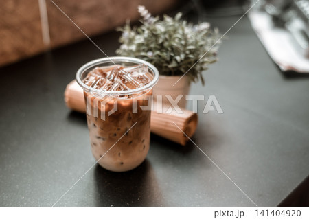 ice coffee on wood background 141404920