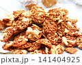 a pile of muesli 141404925