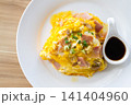 egg omelette with tomato sauce 141404960