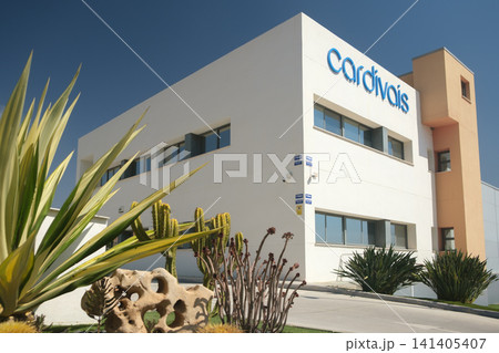 Contemporary -Cordivais- building with sleek design, desert landscaping, and large windows in a sunny locale. perfect for modern architecture themes. 141405407