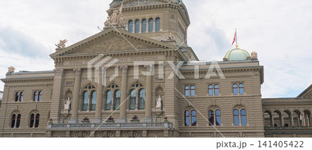 Curia Confoederationis Helveticae Latin phrase on Federal Palace Bundeshaus in Bern, Switzerland. Origin of Swiss country code CH, famous historical monument and parliament building facade Curia Confoederationis Helveticae Latin phrase on Federal Palace Bundeshaus in Bern, Switzerland. Origin of Swiss country code CH, famous historical monument and parliament building facade 141405422