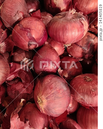 Fresh Red Onions Piled Together at Local Market 141405819