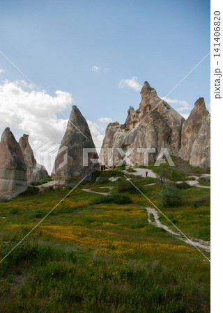 Cappadocia landscape with fairy chimneys and dramatic rocky valley in Turkey Cappadocia landscape with fairy chimneys and dramatic rocky valley in Turkey 141406820