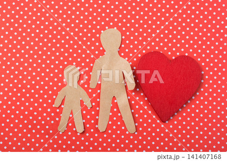 Paper man shape in hand in the view 141407168