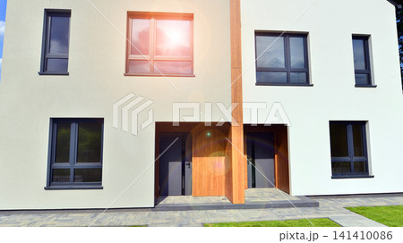 Newly constructed semi detached house for families. Modern design, technology, and real estate market concept. 141410086