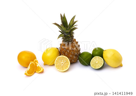 Pineapple with lemon and lime and oranges on a white background. Group of citrus fruits close-up. Lime green, pineapple, orange orange, lemon close-up on an isolated white background. Pineapple with lemon and lime and oranges on a white background. Group of citrus fruits close-up. Lime green, pineapple, orange orange, lemon close-up on an isolated white background. 141411949