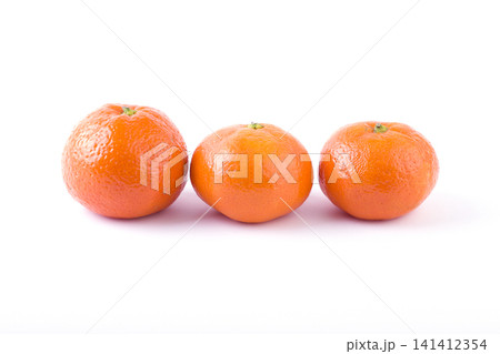 fresh mandarines isolated on white background. Oranges are arranged in rows. Placed on a white background. fresh mandarines isolated on white background. Oranges are arranged in rows. Placed on a white background. 141412354