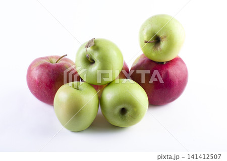 Fresh red and green apples on a white background. A group of apples on a white background. Fresh red and green apples on a white background. A group of apples on a white background. 141412507