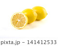 Lemons with leaves on a white background. Fresh lemons on a white background. 141412533