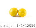 Lemons with leaves on a white background. Fresh lemons on a white background. 141412539