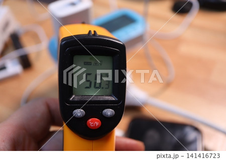 Digital Thermometer Displaying 50.3 Degrees Celsius 141416723