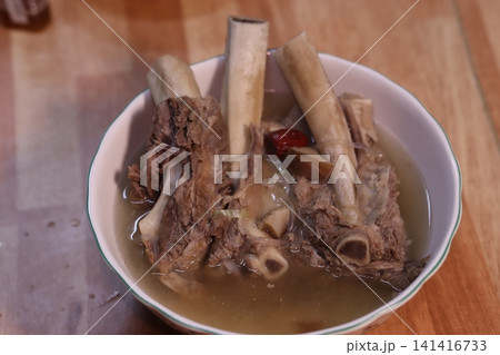 Bowl of Bone Soup with Meat and Ingredients Bowl of Bone Soup with Meat and Ingredients 141416733