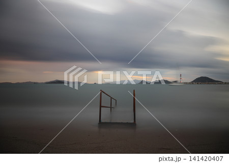 sunset on the beach. Seaside town of Turgutreis and spectacular sunsets. Selective Focus. Long Exposure shoot. tranquility scene. sunset on the beach. Seaside town of Turgutreis and spectacular sunsets. Selective Focus. Long Exposure shoot. tranquility scene. 141420407