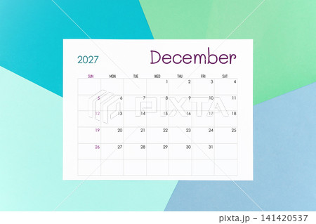 December calendar card for 2027 year on colorful background. Flat lay. December calendar card for 2027 year on colorful background. Flat lay. 141420537