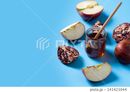 Traditional Rosh Hashanah food on bleu background. Copy space Traditional Rosh Hashanah food on bleu background. Copy space 141421044