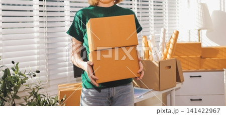 Logistics, small business woman with checklist for stock, clothes order or retail inventory management. Shipping, writing or person at ecommerce startup store for sme delivery with fashion designer Logistics, small business woman with checklist for stock, clothes order or retail inventory management. Shipping, writing or person at ecommerce startup store for sme delivery with fashion designer 141422967