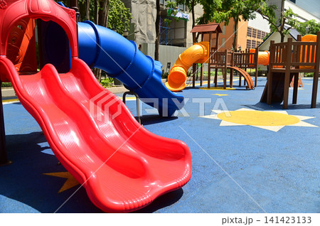 Climbing structures and slides are playground equipment for children, which are part of the public park in Bangkok capital city , Thailand. Climbing structures and slides are playground equipment for children, which are part of the public park in Bangkok capital city , Thailand. 141423133