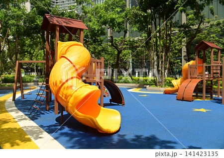 Climbing structures and slides are playground equipment for children, which are part of the public park in Bangkok capital city , Thailand. Climbing structures and slides are playground equipment for children, which are part of the public park in Bangkok capital city , Thailand. 141423135
