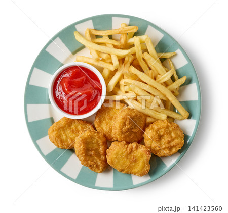 Plate of Chicken Nuggets, French Fries and Tomato Ketchup Isolated on White Background Plate of Chicken Nuggets, French Fries and Tomato Ketchup Isolated on White Background 141423560