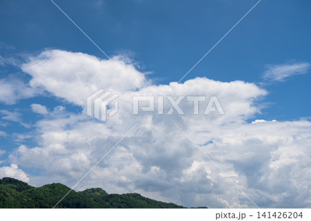 Blue mountains, white sky, and white clouds Blue mountains, white sky, and white clouds 141426204