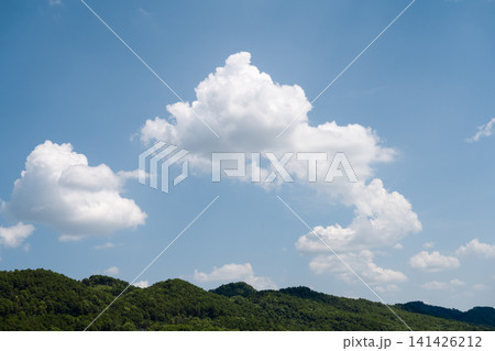 Blue mountains, white sky, and white clouds Blue mountains, white sky, and white clouds 141426212