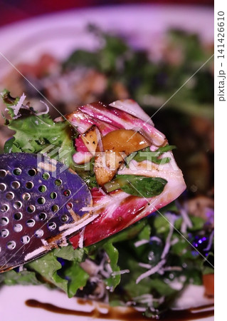 Salad with Radicchio and Mushrooms in Strainer 141426610