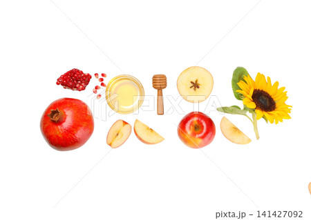 Seasonal display of pomegranates and apples, isolated on white, PNG Seasonal display of pomegranates and apples, isolated on white, PNG 141427092
