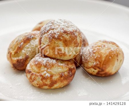 Danish Aebleskiver Pancake Balls Dessert Close Up with Sugar 141429128
