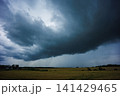 Angry supercell storm influenced by Climate change. Dangerous storm supercell shelf cloud with layers 141429465