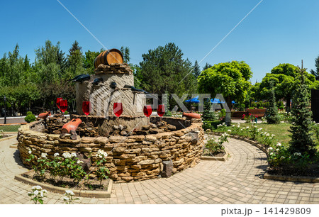 Beautiful stone wine fountain at Milestii Mici winery entrance Beautiful stone wine fountain at Milestii Mici winery entrance 141429809