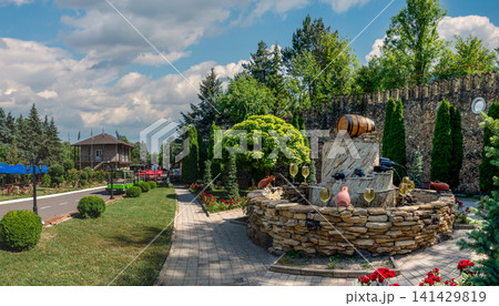 Beautiful stone wine fountain at Milestii Mici winery entrance Beautiful stone wine fountain at Milestii Mici winery entrance 141429819