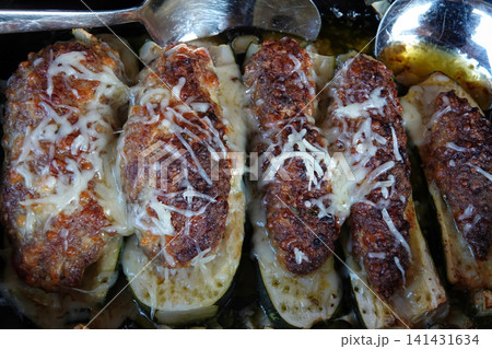 Delicious Stuffed Zucchini Boats with Melted Cheese and Flavorful Filling Ready to Serve Delicious Stuffed Zucchini Boats with Melted Cheese and Flavorful Filling Ready to Serve 141431634