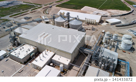 Aerial View Of Large Industrial Plant With Silos And Storage Tanks Aerial View Of Large Industrial Plant With Silos And Storage Tanks 141433872
