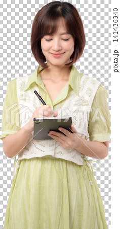 Asian woman transparent background tablet pen writing focused happy portrait isolated studio work creative design digital graphic professional style outfit green clothing. PNG file format Asian woman transparent background tablet pen writing focused happy portrait isolated studio work creative design digital graphic professional style outfit green clothing. PNG file format 141436340